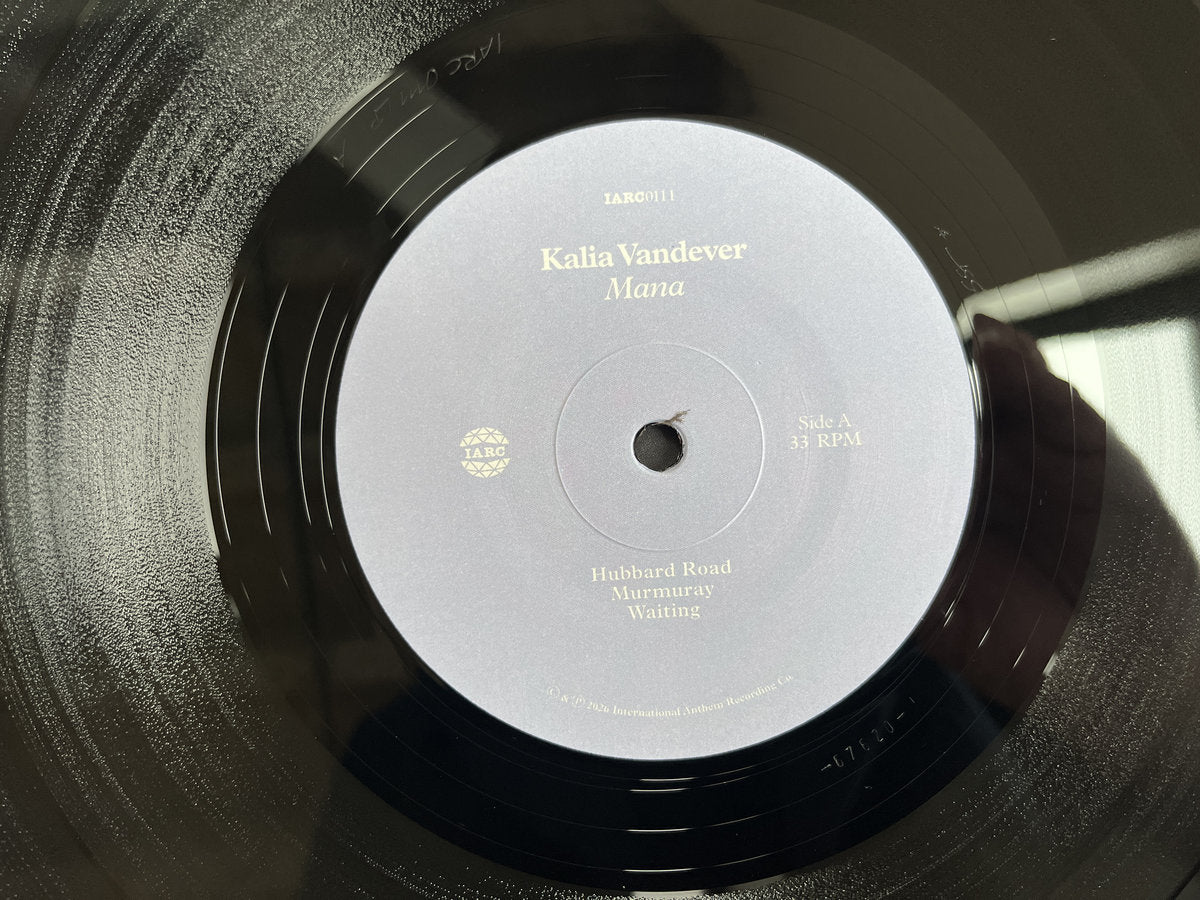 Mana Classic Black vinyl, side A label [Classic Black]